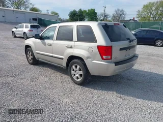 2008 Jeep Grand Cherokee Laredo with VIN 1J8GR48K88C107253, listed as a IAAI auction lot 42018165 with 239,222 mi miles. Bid and sale history available at carsss.com. Image 3.