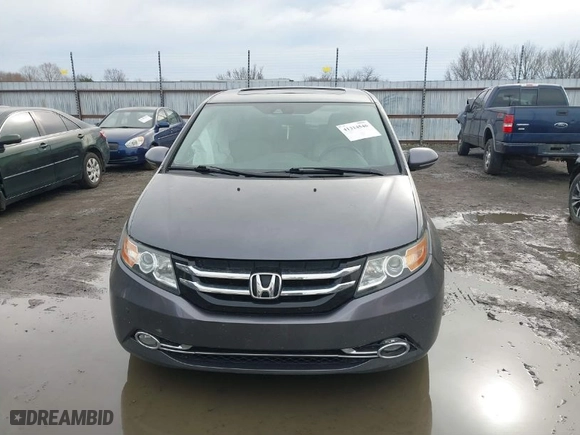 2014 Honda Odyssey Touring with VIN 5FNRL5H94EB001076, listed as a IAAI auction lot 41314546 with NaN miles. Bid and sale history available at carsss.com. Image 12.