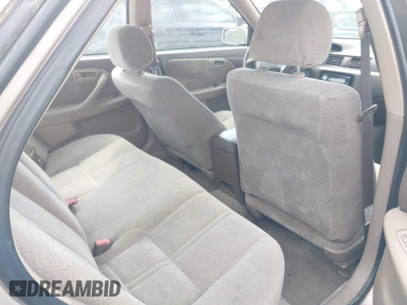 2000 Toyota Camry LE z VIN 4T1BF22K5YU938013, wystawiony jako IAAI lot #42477316 z przebiegiem 239 736 mil mil oraz . Historia ofert i sprzedaży dostępna na DreamBid. Obrazek 8.