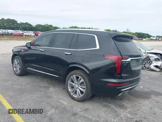 2023 Cadillac XT6 FWD Premium Luxury with VIN 1GYKPCRS6PZ106284, listed as a IAAI auction lot 41595617 with 32,795 mi miles and . Bid and sale history available at DreamBid. Image 3.