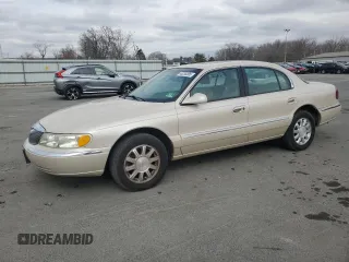 2001 Lincoln Continental with VIN 1LNHM97V71Y711352, listed as a Copart auction lot 46235305 with 122,786 mi miles and Salvage Title. Bid and sale history available at carsss.com. Image 1.