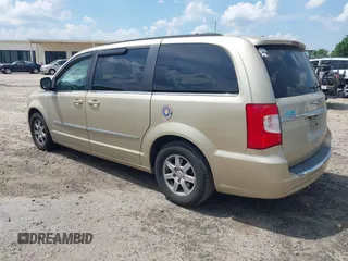 2011 Chrysler Town & Country Touring with VIN 2A4RR5DGXBR613179, listed as a IAAI auction lot 42143355 with 180,906 mi miles and . Bid and sale history available at DreamBid. Image 3.