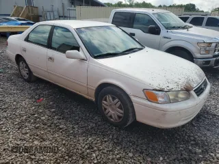 2000 Toyota Camry CE z VIN 4T1BG22K5YU936033, wystawiony jako Copart lot #57636215 z przebiegiem 242 889 mil mil oraz Szkoda całkowita • Salvage title. Historia ofert i sprzedaży dostępna na DreamBid. Obrazek 4.