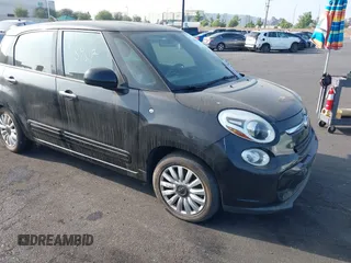 2014 FIAT 500L Easy z VIN ZFBCFABH1EZ002138, wystawiony jako IAAI lot #42588407 z przebiegiem 128 695 mil mil oraz . Historia ofert i sprzedaży dostępna na DreamBid. Obrazek 1.