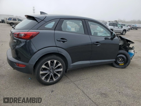 2019 Mazda CX-3 Touring with VIN JM1DKFC71K0424748, listed as a Copart auction lot 51145325 with 89,500 mi miles and Salvage Title. Bid and sale history available at DreamBid. Image 3.