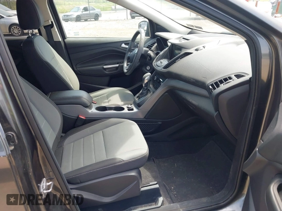 2016 Ford Escape SE with VIN 1FMCU9GX8GUB42944, listed as a IAAI auction lot 42171770 with 120,041 mi miles. Bid and sale history available at carsss.com. Image 5.