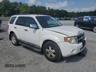2012 Ford Escape XLT with VIN 1FMCU9D73CKC29497, listed as a Copart auction lot 63211965 with 142,134 mi miles and Salvage title. Bid and sale history available at DreamBid. Image 4.