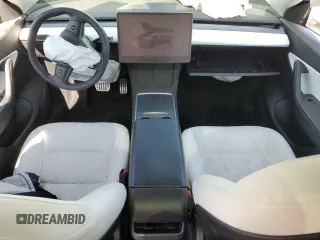 2022 Tesla Model Y Performance with VIN 7SAYGDEF9NF392197, listed as a Copart auction lot 57259105 with 43,400 mi miles and Salvage title. Bid and sale history available at DreamBid. Image 8.