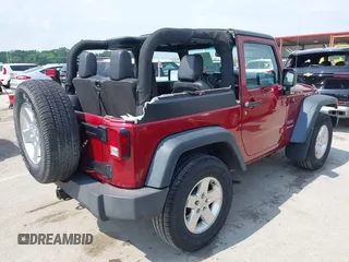 2013 Jeep Wrangler Sport z VIN 1C4GJWAG0DL543850, wystawiony jako IAAI lot #42374916 z przebiegiem 163 977 mil mil oraz . Historia ofert i sprzedaży dostępna na DreamBid. Obrazek 4.