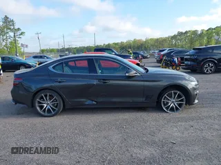 2023 Genesis G70 2.0T with VIN KMTG34TA4PU126965, listed as a IAAI auction lot 41971103 with 27,304 mi miles. Bid and sale history available at carsss.com. Image 13.