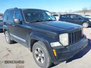 2008 Jeep Liberty Sport with VIN 1J8GP28K38W227910, listed as a IAAI auction lot 41244738 with 215,126 mi miles. Bid and sale history available at carsss.com. Image 1.