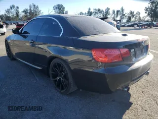 2011 BMW 3 Series 335i with VIN WBADX7C55BE580281, listed as a Copart auction lot 88149145 with 94,927 mi miles and Salvage Title. Bid and sale history available at carsss.com. Image 2.