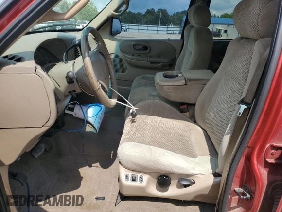 2001 Ford F-150 XLT with VIN 1FTRW076X1KC42302, listed as a Copart auction lot 59868295 with 234,772 mi miles and Salvage title. Bid and sale history available at DreamBid. Image 7.