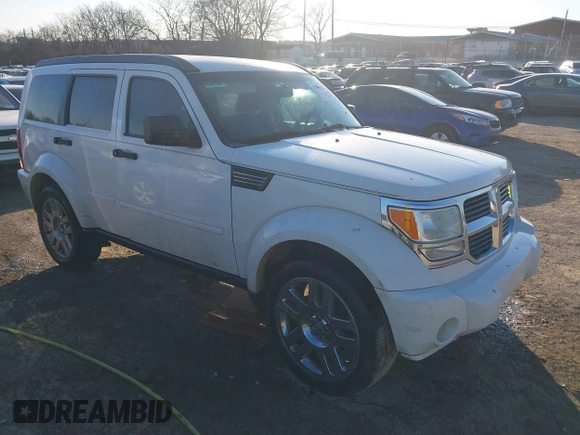 2007 Dodge Nitro SLT with VIN 1D8GU58K67W692313, listed as a IAAI auction lot 41441915 with 195,521 mi miles. Bid and sale history available at carsss.com. Image 1.
