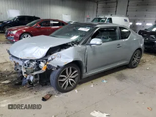 2014 Scion tC z VIN JTKJF5C71E3071683, wystawiony jako Copart lot #50971055 z przebiegiem Nie podano mil oraz Nie do naprawy • Non repairable. Historia ofert i sprzedaży dostępna na DreamBid. Obrazek 1.
