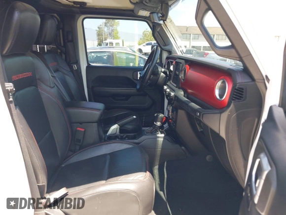 2018 Jeep Wrangler Unlimited Rubicon with VIN 1C4HJXFN8JW215023, listed as a IAAI auction lot 42227099 with 62,195 mi miles and . Bid and sale history available at DreamBid. Image 5.