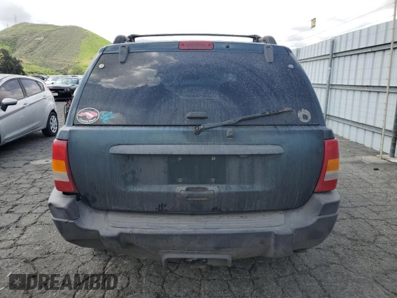 2004 Jeep Grand Cherokee Laredo with VIN 1J4GX48N94C397241, listed as a Copart auction lot 49183315 with 189,099 mi miles and Salvage title. Bid and sale history available at DreamBid. Image 6.