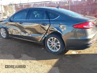 2020 Ford Fusion SE with VIN 3FA6P0H75LR129109, listed as a IAAI auction lot 41385458 with 98,099 mi miles. Bid and sale history available at carsss.com. Image 3.