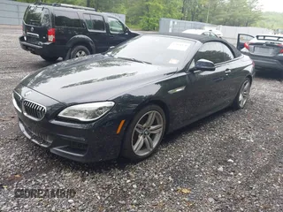 2017 BMW 6 Series 650i xDrive z VIN WBA6F7C52HD930816, wystawiony jako IAAI lot #42168478 z przebiegiem 89 191 mil mil oraz . Historia ofert i sprzedaży dostępna na DreamBid. Obrazek 2.