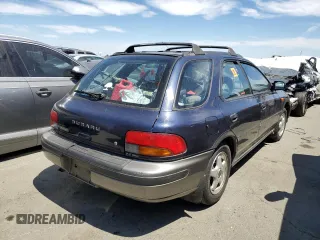 1996 Subaru Impreza Outback with VIN JF1GF4851TG811571, listed as a Copart auction lot 65650514 with 248,315 mi miles and Salvage title. Bid and sale history available at DreamBid. Image 3.