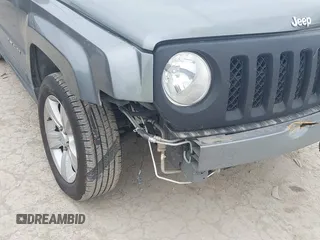 2014 Jeep Patriot Latitude with VIN 1C4NJPFAXED507693, listed as a IAAI auction lot 41701193 with 104,130 mi miles and . Bid and sale history available at DreamBid. Image 6.