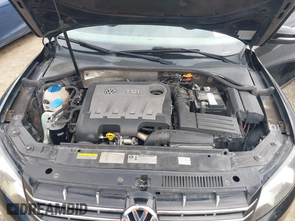 2014 Volkswagen Passat TDI SEL Premium with VIN 1VWCN7A33EC068280, listed as a IAAI auction lot 42086420 with 153,656 mi miles. Bid and sale history available at carsss.com. Image 10.