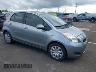 2009 Toyota Yaris with VIN JTDKT903295237216, listed as a IAAI auction lot 42087676 with 158,341 mi miles. Bid and sale history available at carsss.com. Image 1.
