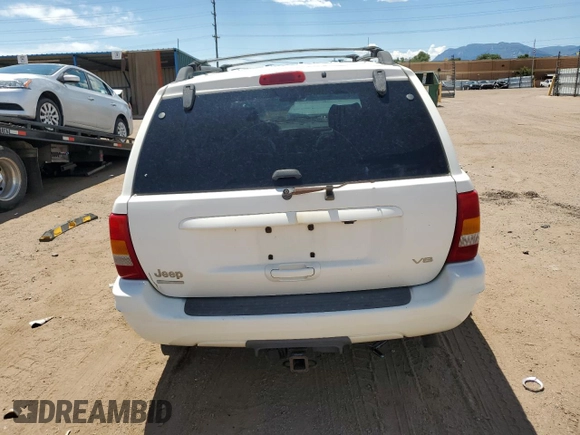 1999 Jeep Grand Cherokee Limited with VIN 1J4GW68N5XC549051, listed as a Copart auction lot 64376325 with 205,276 mi miles and Clean title. Bid and sale history available at DreamBid. Image 7.
