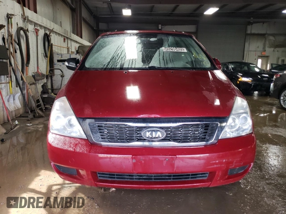 2012 Kia Sedona LX with VIN KNDMG4C71C6432577, listed as a Copart auction lot 49298405 with 205,983 mi miles and Salvage Title. Bid and sale history available at carsss.com. Image 5.