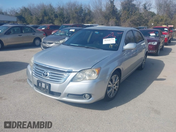 2008 Toyota Avalon XL with VIN 4T1BK36B38U281031, listed as a IAAI auction lot 41268774 with 303,156 mi miles. Bid and sale history available at carsss.com. Image 2.