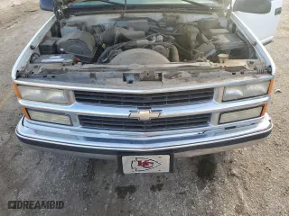 1999 Chevrolet Tahoe with VIN 1GNEC13RXXJ519095, listed as a Copart auction lot 43254645 with 176,861 mi miles and Salvage Title. Bid and sale history available at carsss.com. Image 12.