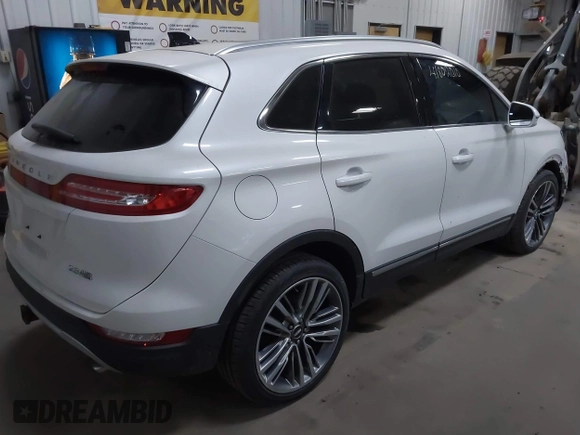 2016 Lincoln MKC Reserve z VIN 5LMTJ3DH6GUJ11160, wystawiony jako IAAI lot #41802010 z przebiegiem 96 861 mil mil oraz . Historia ofert i sprzedaży dostępna na DreamBid. Obrazek 4.