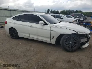 2015 BMW 3 Series Gran Turismo 328i xDrive with VIN WBA8Z5C5XFD671820, listed as a Copart auction lot 65210804 with 165,176 mi miles and Salvage Title. Bid and sale history available at carsss.com. Image 4.
