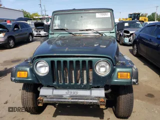 2000 Jeep Wrangler Sport with VIN 1J4FA49S4YP741154, listed as a Copart auction lot 71006864 with 200,684 mi miles and Clean Title. Bid and sale history available at carsss.com. Image 5.