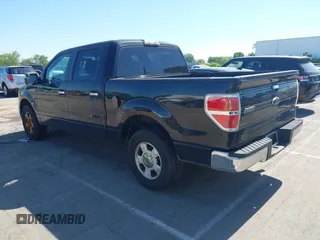 2014 Ford F-150 XL with VIN 1FTFW1CF5EKD93147, listed as a IAAI auction lot 42069973 with 277,140 mi miles. Bid and sale history available at carsss.com. Image 3.