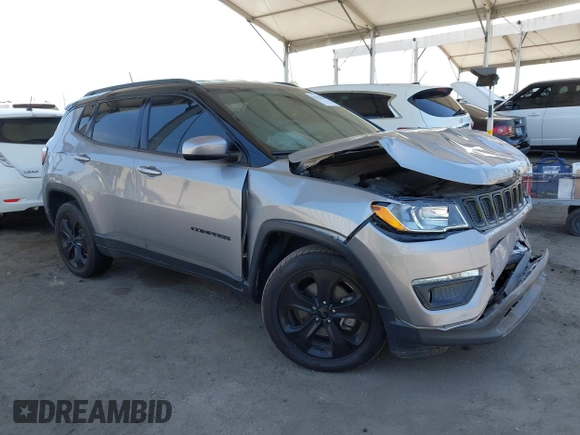 2019 Jeep Compass Latitude with VIN 3C4NJDBB4KT754484, listed as a IAAI auction lot 42324284 with 85,637 mi miles and . Bid and sale history available at DreamBid. Image 1.