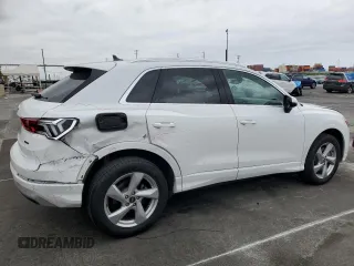2021 Audi Q3 Premium with VIN WA1AUCF39M1061658, listed as a Copart auction lot 50717875 with 87,363 mi miles and Salvage title. Bid and sale history available at DreamBid. Image 3.