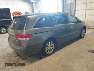 2017 Honda Odyssey SE with VIN 5FNRL5H33HB011792, listed as a IAAI auction lot 41718016 with 82,888 mi miles and . Bid and sale history available at carsss.com. Image 4.