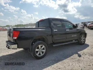 2011 Nissan Titan SL z VIN 1N6AA0EC8BN312137, wystawiony jako Copart lot #60227105 z przebiegiem 194 973 mil mil oraz Szkoda całkowita • Salvage title. Historia ofert i sprzedaży dostępna na DreamBid. Obrazek 3.