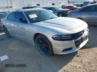 2021 Dodge Charger SXT with VIN 2C3CDXBG0MH562538, listed as a IAAI auction lot 41877128 with 54,934 mi miles and . Bid and sale history available at DreamBid. Image 1.