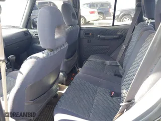 1998 Toyota RAV4 with VIN JT3GP10V7W7037711, listed as a IAAI auction lot 42081313 with 233,554 mi miles. Bid and sale history available at carsss.com. Image 8.
