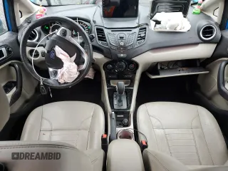2016 Ford Fiesta Titanium z VIN 3FADP4CJ3GM108313, wystawiony jako Copart lot #78457954 z przebiegiem 44 726 mil mil oraz Szkoda całkowita • Salvage title. Historia ofert i sprzedaży dostępna na DreamBid. Obrazek 8.