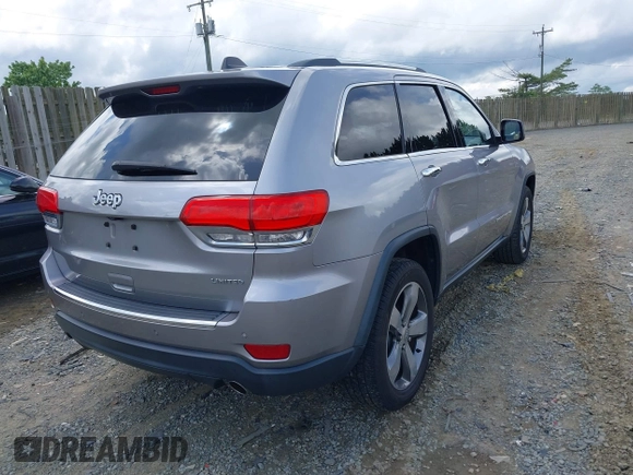 2014 Jeep Grand Cherokee Limited with VIN 1C4RJEBG0EC547674, listed as a IAAI auction lot 42198600 with 122,969 mi miles and . Bid and sale history available at DreamBid. Image 4.