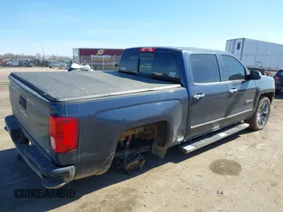 2018 Chevrolet Silverado 1500 LTZ with VIN 3GCUKSEC1JG518593, listed as a IAAI auction lot 41762848 with 103,362 mi miles. Bid and sale history available at carsss.com. Image 4.