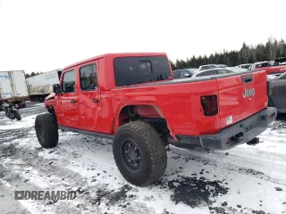 2020 Jeep Gladiator Overland with VIN 1C6HJTFG9LL152701, listed as a Copart auction lot 80737794 with 61,654 mi miles and Salvage title. Bid and sale history available at DreamBid. Image 2.