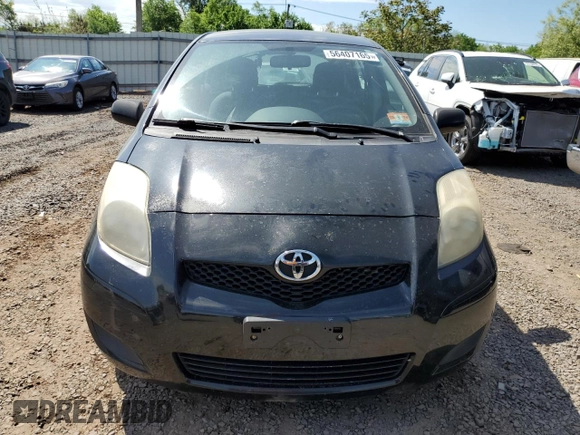 2009 Toyota Yaris with VIN JTDKT903795233081, listed as a Copart auction lot 56407165 with 172,631 mi miles and Clean Title. Bid and sale history available at DreamBid. Image 5.