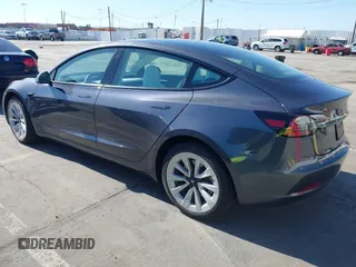 2023 Tesla Model 3 Long Range z VIN 5YJ3E1EB7PF704061, wystawiony jako IAAI lot #42079045 z przebiegiem 4 012 mil mil oraz . Historia ofert i sprzedaży dostępna na DreamBid. Obrazek 3.