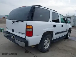 2001 Chevrolet Tahoe LT with VIN 1GNEC13T51R158637, listed as a IAAI auction lot 41718610 with 101,984 mi miles. Bid and sale history available at carsss.com. Image 4.