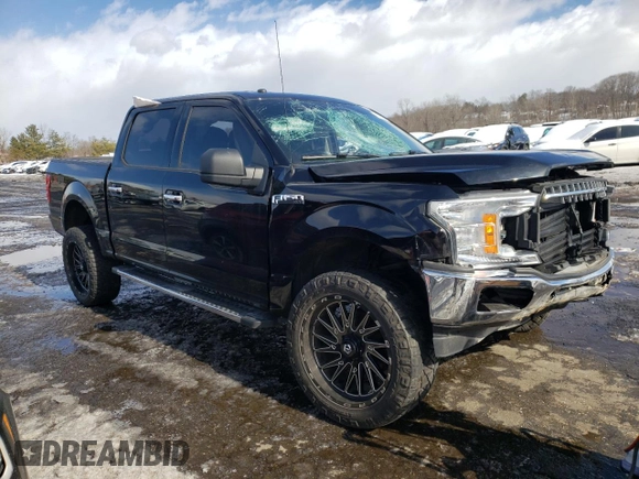 2018 Ford F-150 XL with VIN 1FTEW1E54JFB74361, listed as a Copart auction lot 45293295 with 153,456 mi miles and Salvage Title. Bid and sale history available at carsss.com. Image 4.