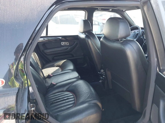 2001 Bentley Arnage with VIN SCBLC31E11CX06297, listed as a IAAI auction lot 41980275 with 63,510 mi miles and . Bid and sale history available at DreamBid. Image 8.